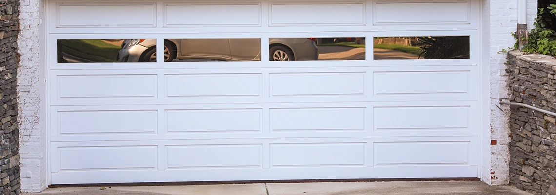 Wood Garage Door Bang Sound Repair in Alberta
