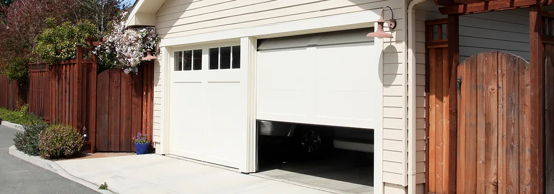 Fix Metal Garage Door Jerking in Edmonton, Alberta